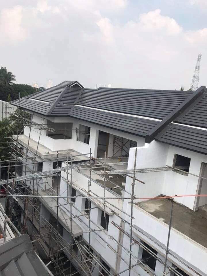 Standing seam metal roof on a home under construction